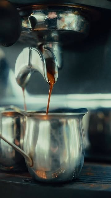 Fresh espresso pouring from the machine