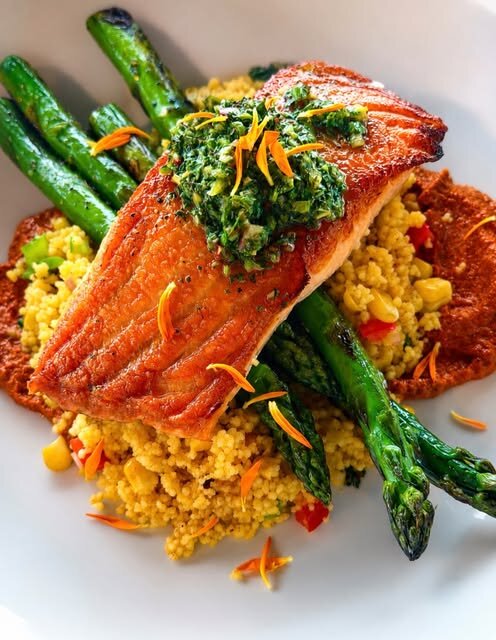 Seared salmon over saffron rice with asparagus